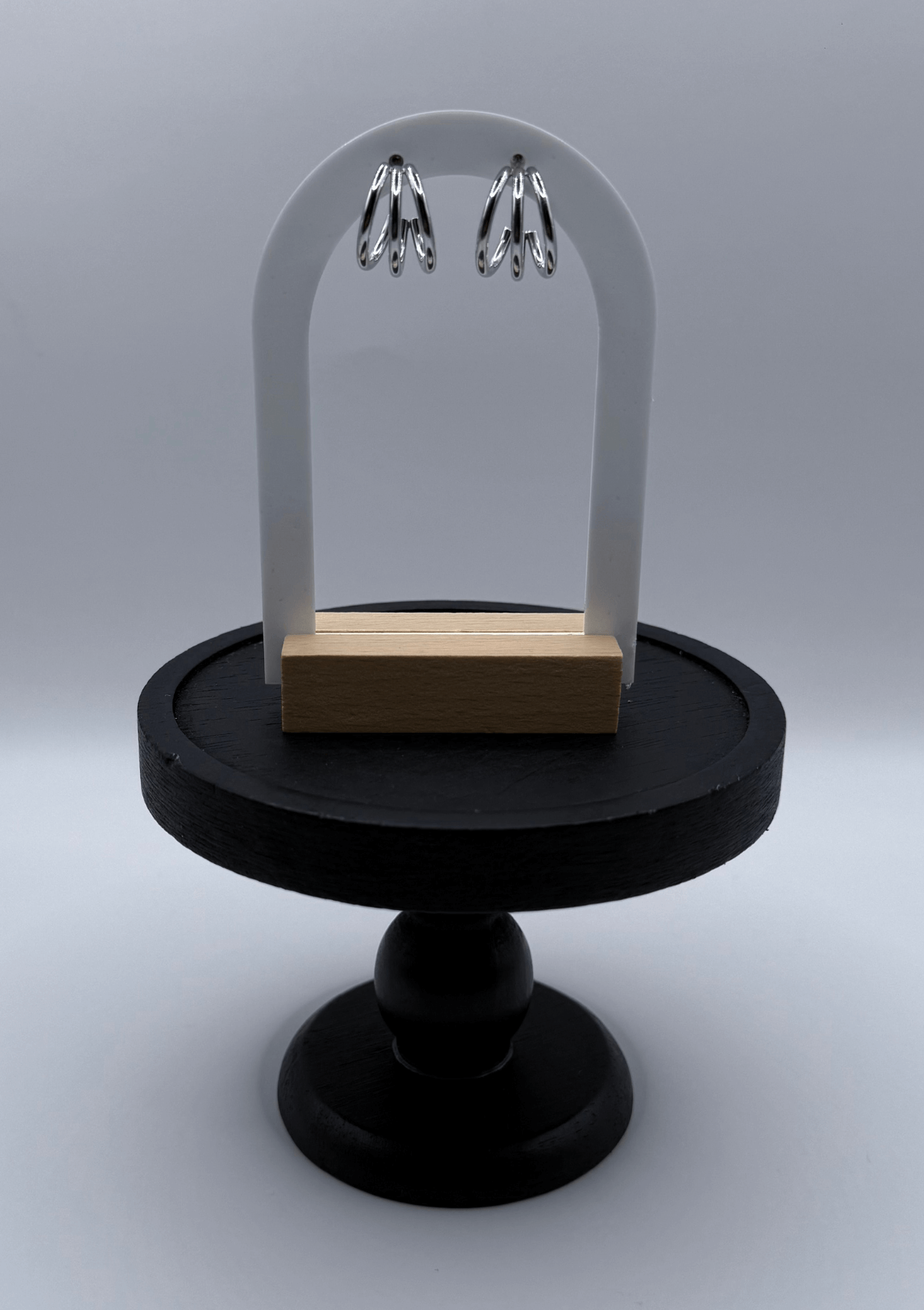 Arracada triple tubular