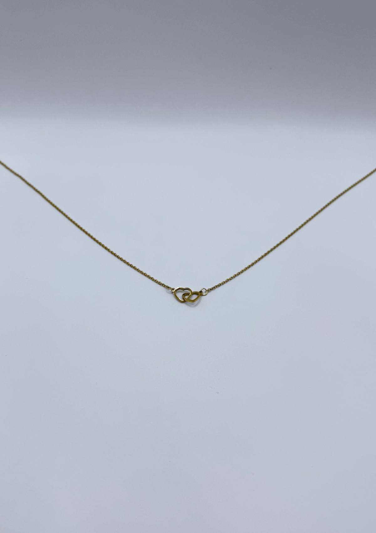 Collar corazones entrelazados