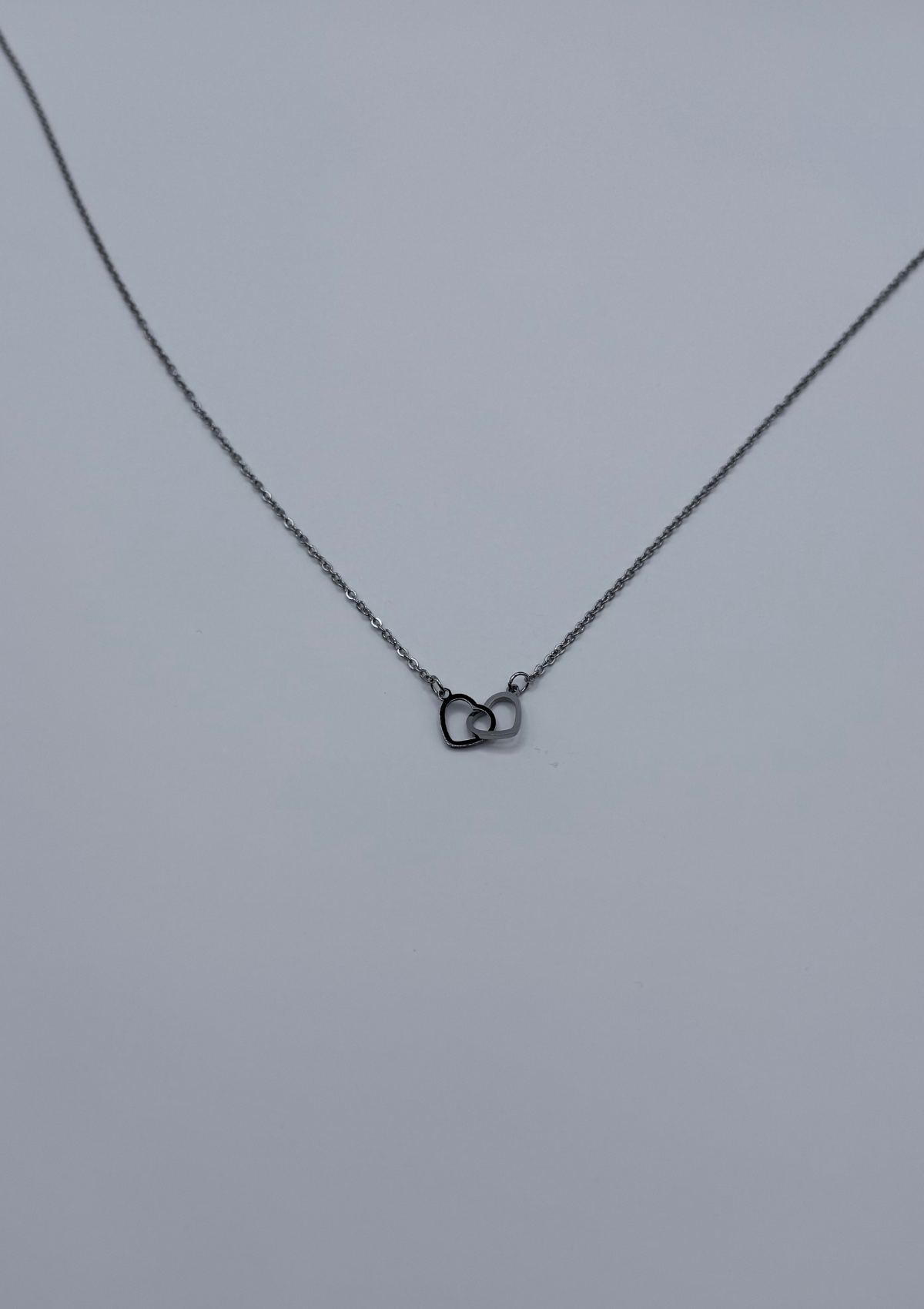 Collar corazones entrelazados