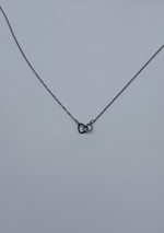 Collar corazones entrelazados