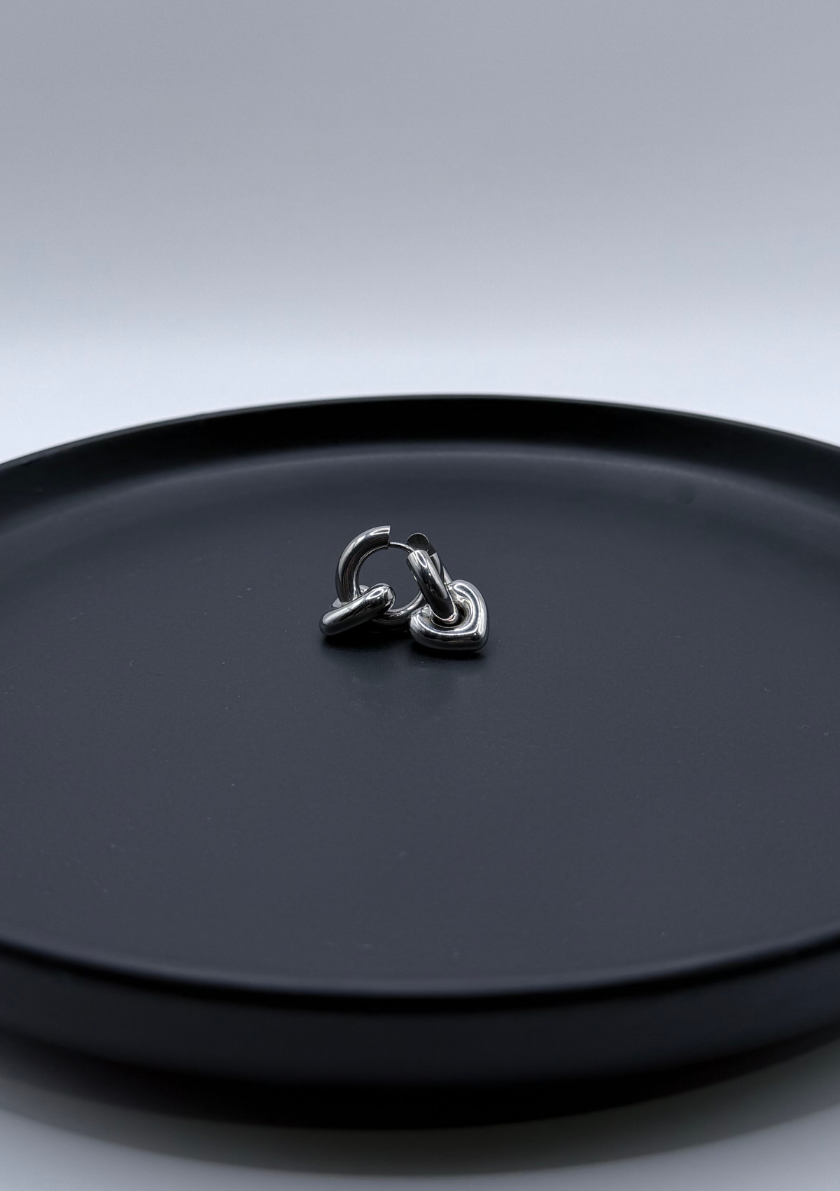 Huggies con corazón colgante