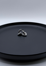 Huggies con corazón colgante